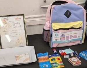 school supplies donation activation. giving back. anniversary celebration. event planning