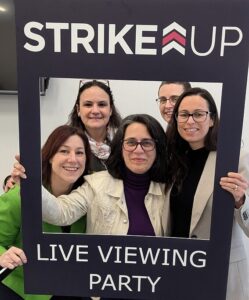 guests enjoying event taking selfies